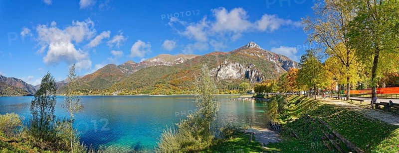 Turquoise lake in autumn vegetation