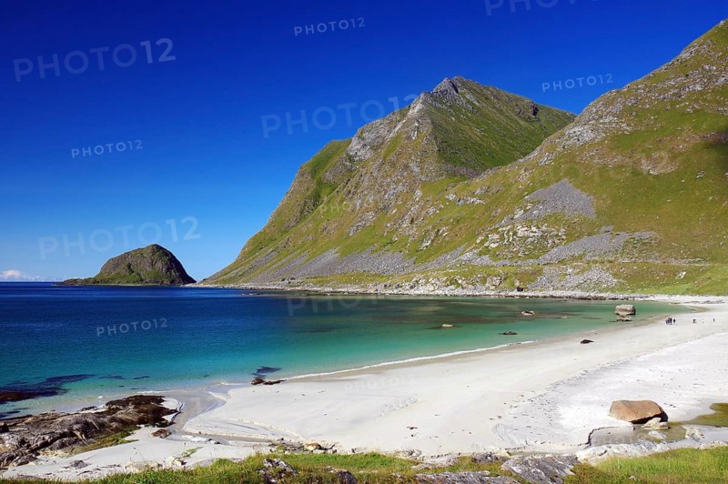 Wide sandy beach and crystal clear water