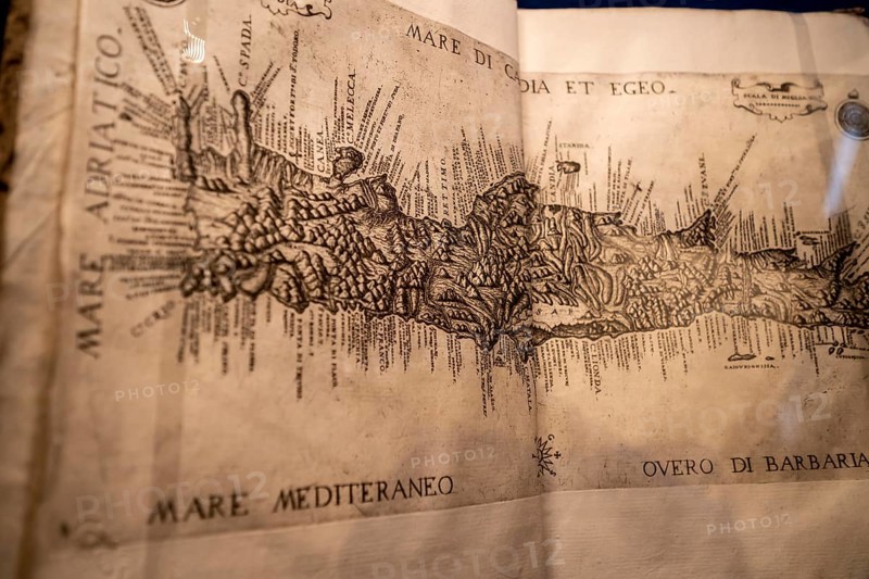 Antique book with an old map of the Mediterranean