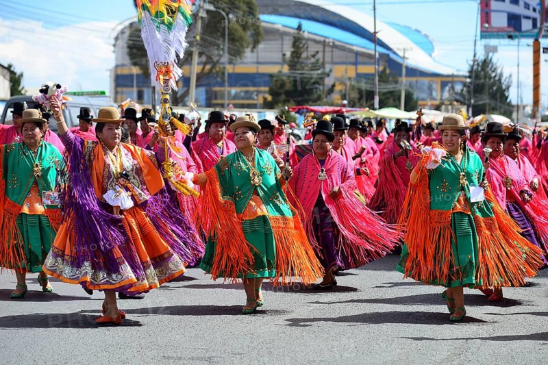 Dance group in traditional costumes at a parade
