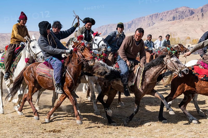 Men practising a traditional Buzkashi game