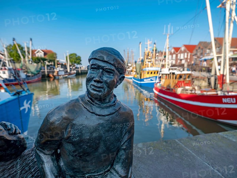 Bronze sculpture of a fisherman