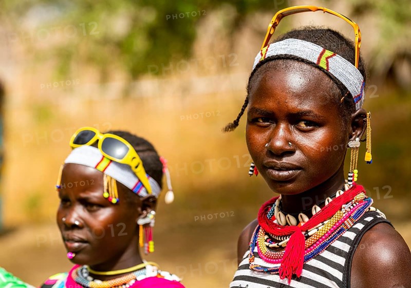 Traditional dressed young girls from the Laarim tribe