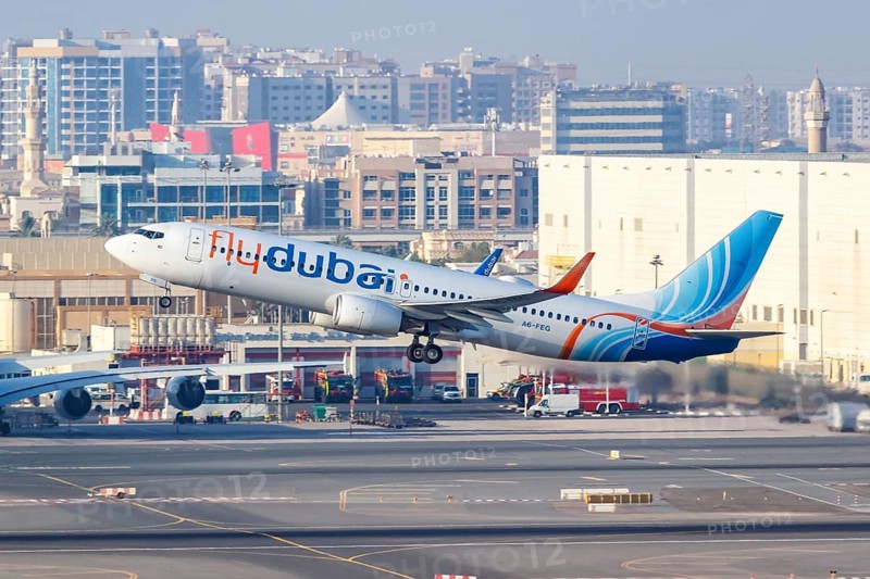 A FlyDubai Boeing 737-800 aircraft with registration A6-FEG takes off from Dubai Airport