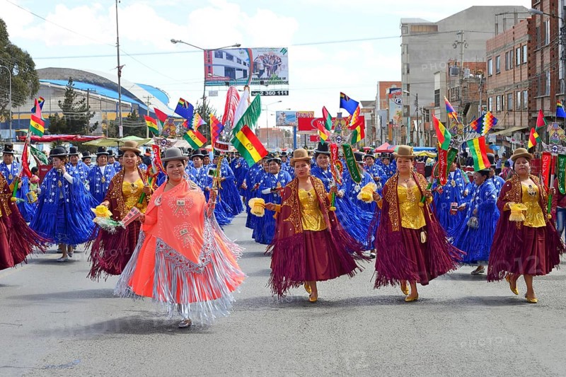 Dance group in traditional costumes at a parade