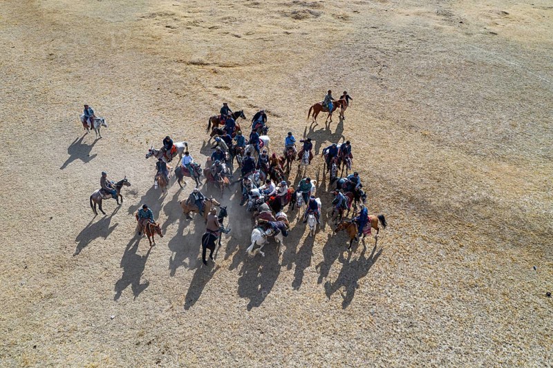 Aerial of a Buzkashi game