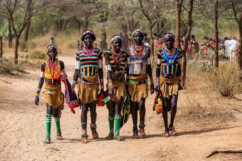 Traditional dressed young girls from the Laarim tribe