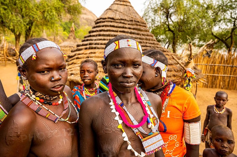 Traditional dressed young girls from the Laarim tribe