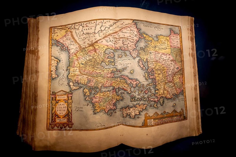 Antique book with an old map of Greece