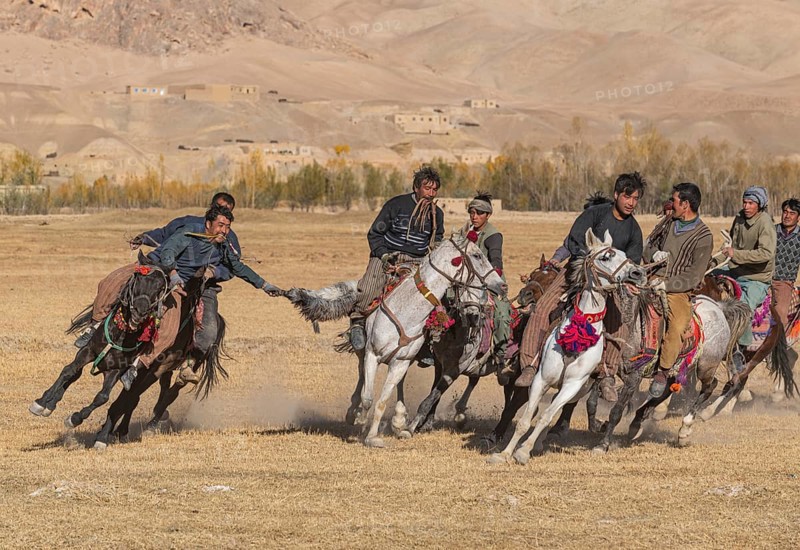 Men practising a traditional Buzkashi game