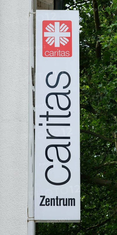 Sign and logo Caritas