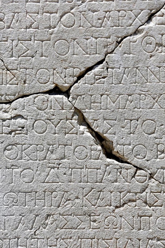Ancient writing on marble plaque