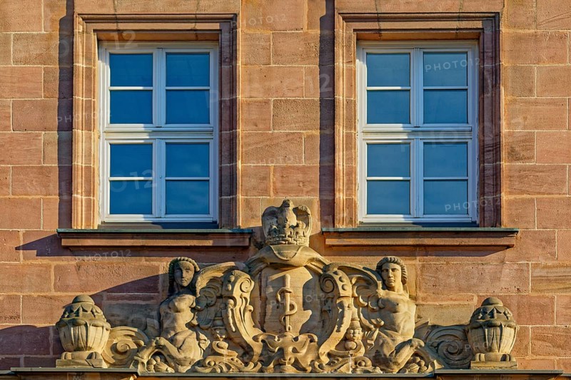 Relief on facade above house entrance
