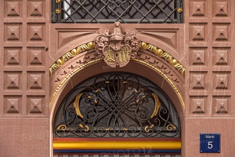 Family coat of arms of the builder on the portal