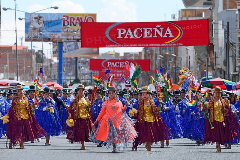 Dance group in traditional costumes at a parade