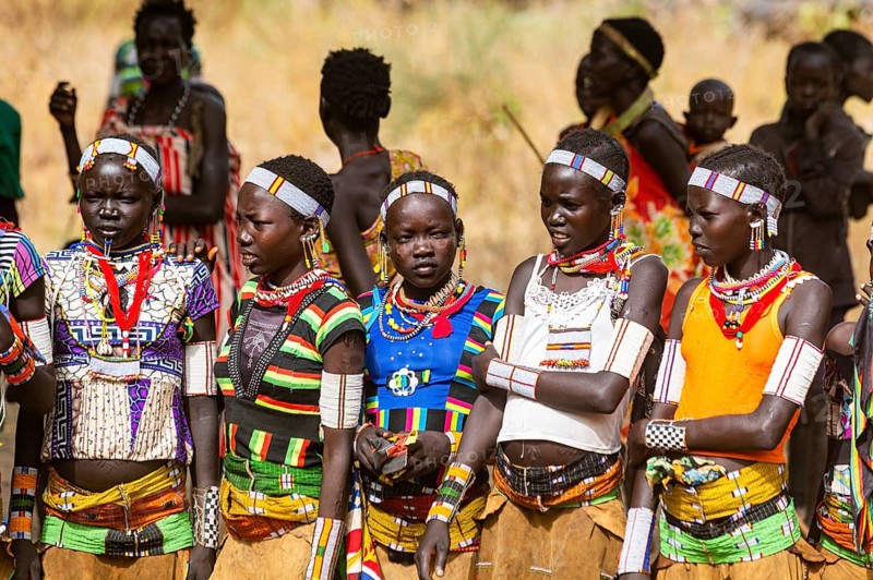 Traditional dressed young girls practising local dances