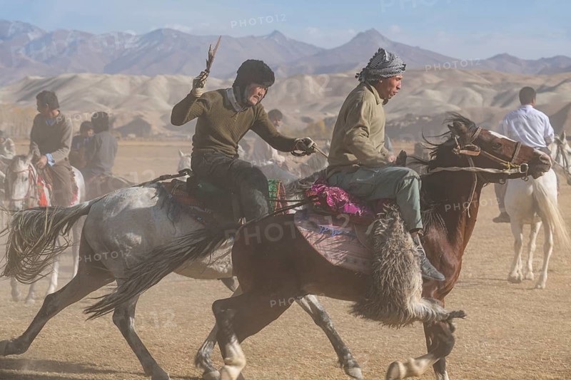 Men practising a traditional Buzkashi game
