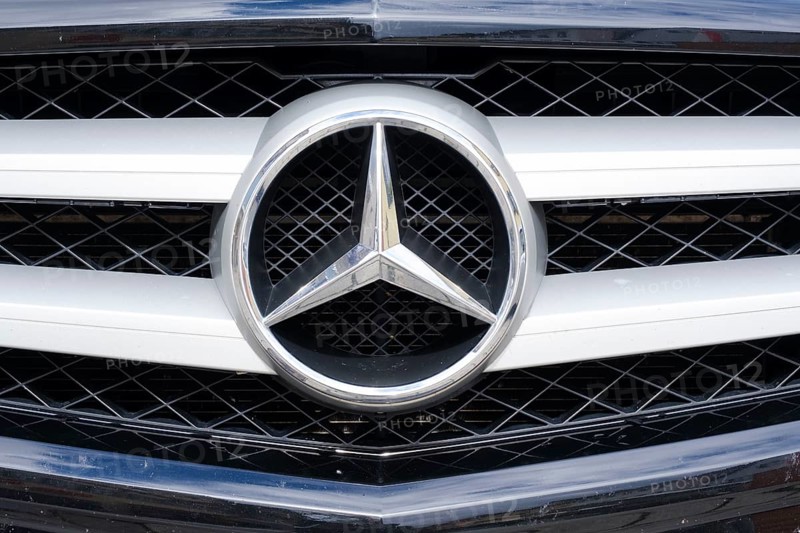 Mercedes star on the radiator grille of the vehicle