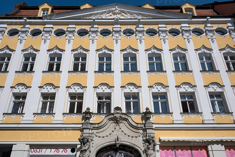 Facade with atlases