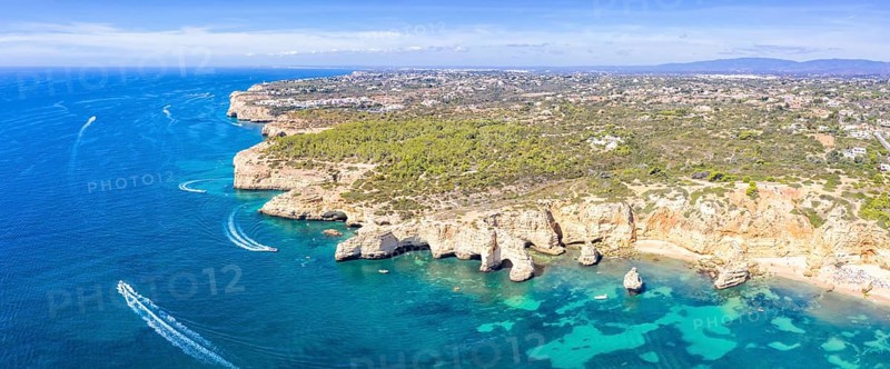 Portugal Algarve beach Praia da Marinha panorama sea ocean drone shot from above in Praia da Marinha