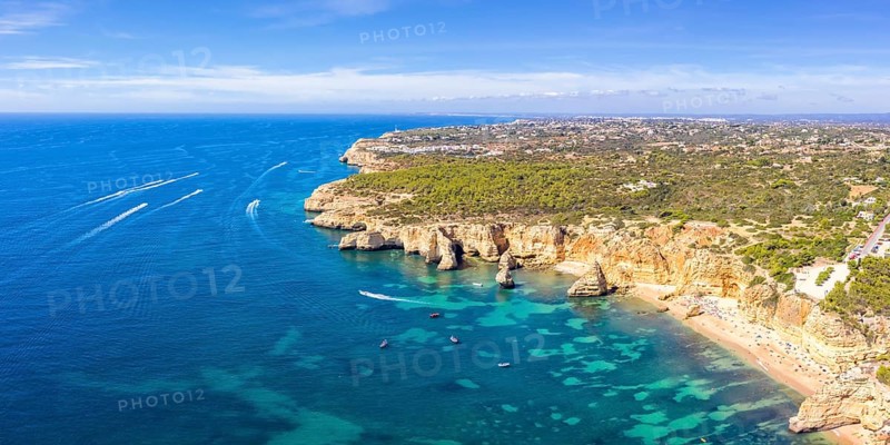 Portugal Algarve beach Praia da Marinha panorama sea ocean drone shot from above in Praia da Marinha