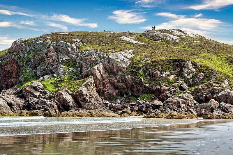 Bay with rocks and sandy beach