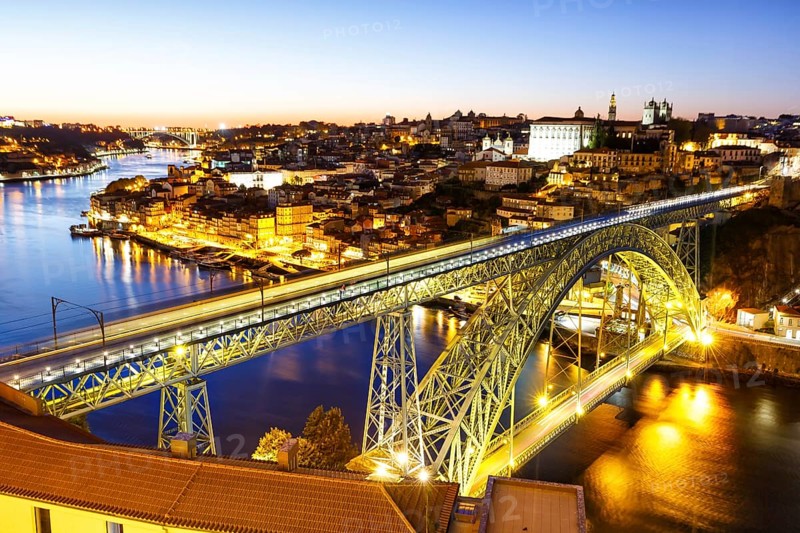 Porto with bridge Ponte Dom Luis I over river Douro night evening travel city in Porto