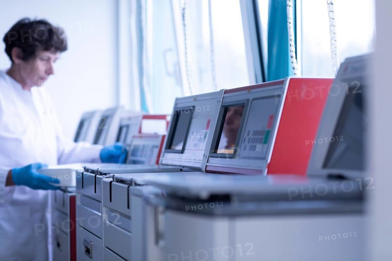 Laboratory equipment in a histology laboratory with employees
