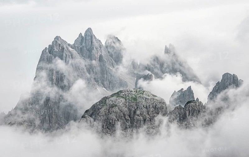 Cloudy rocky mountain peaks