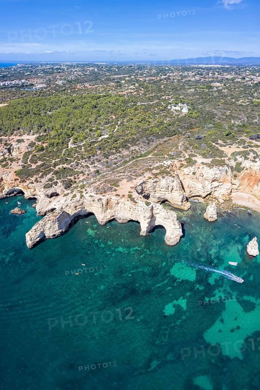 Portugal Algarve beach Praia da Marinha sea ocean drone shot from above in Praia da Marinha