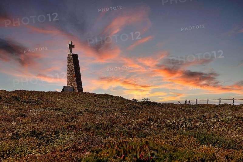 Monument with stone cross marks westernmost point of the continent of Europe