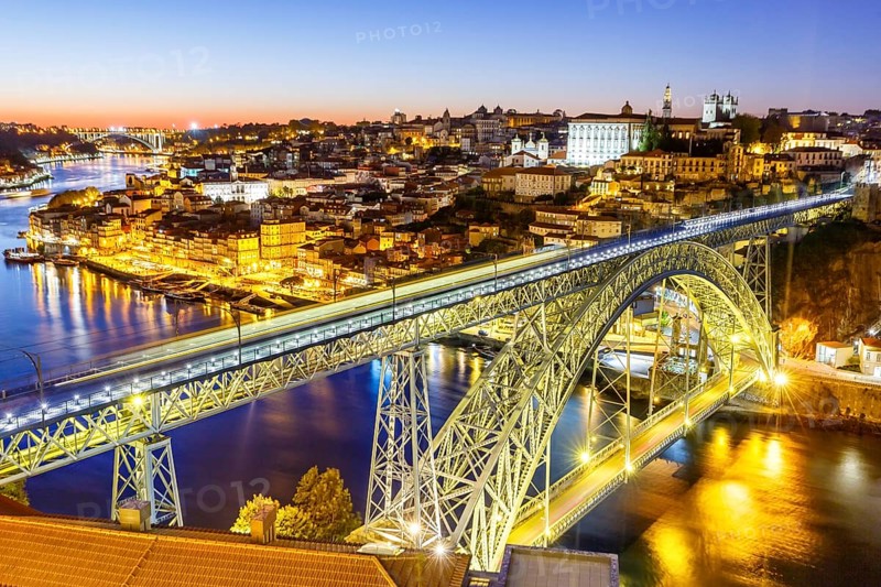 Porto with bridge Ponte Dom Luis I over river Douro night evening travel city in Porto