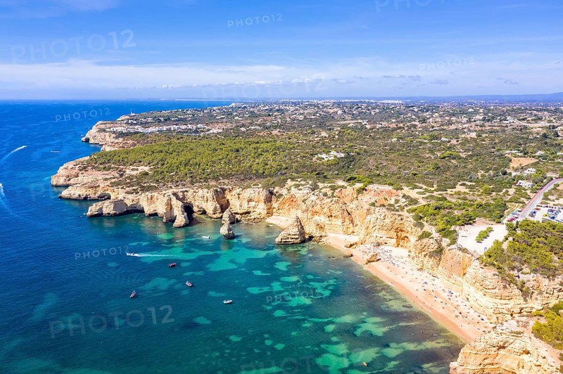 Portugal Algarve beach Praia da Marinha sea ocean drone shot from above in Praia da Marinha