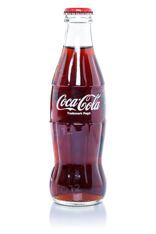 Coca Cola Coca-Cola lemonade soft drink in a bottle cut-out isolated against a white background