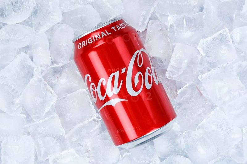 Coca Cola Coca-Cola in a can lemonade soft drink drink on ice cube ice cubes