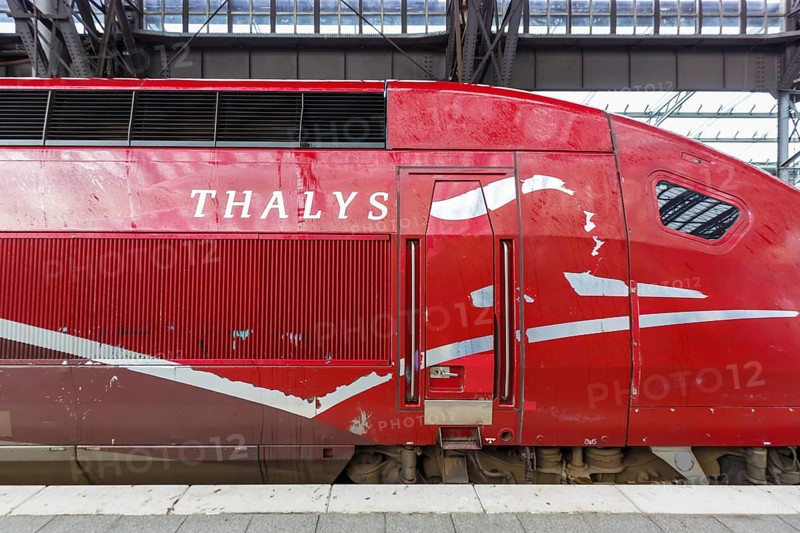 Thalys logo train high speed train powerhead locomotive in the station central railway station Hbf in Cologne