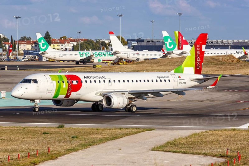 An Embraer 190 aircraft of TAP Portugal Express with registration CS-TPR at Lisbon Airport