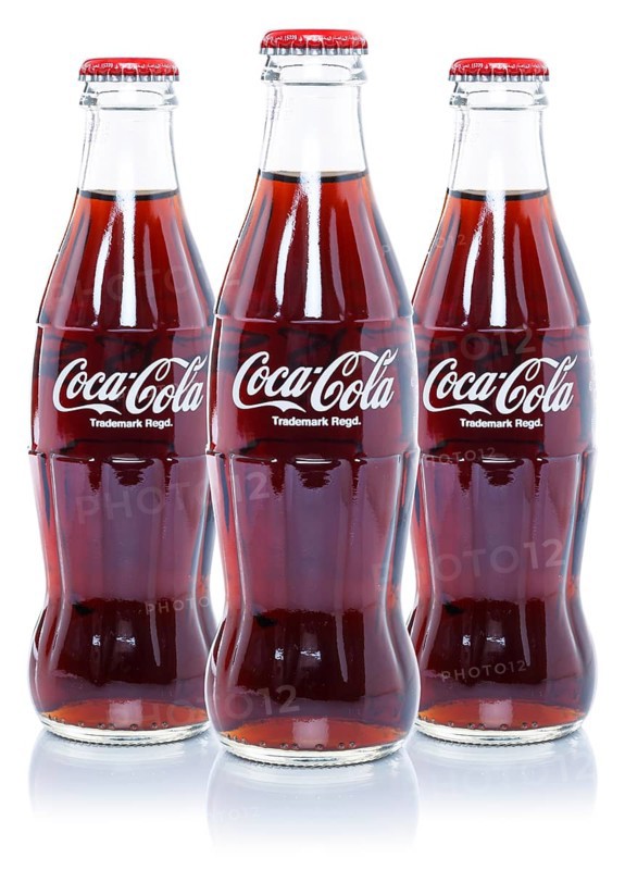 Coca Cola Coca-Cola lemonade soft drink drinks in bottles cut-out isolated against a white background