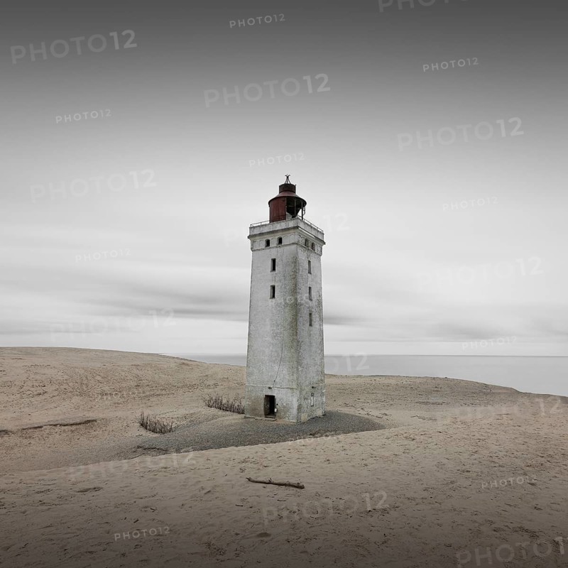 Lighthouse in the Rubjerg Knude shifting sand dune
