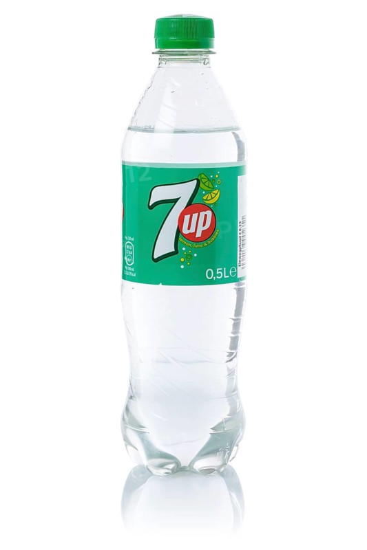 7 up Lemonade soft drink beverage in a plastic bottle cut-out isolated against a white background