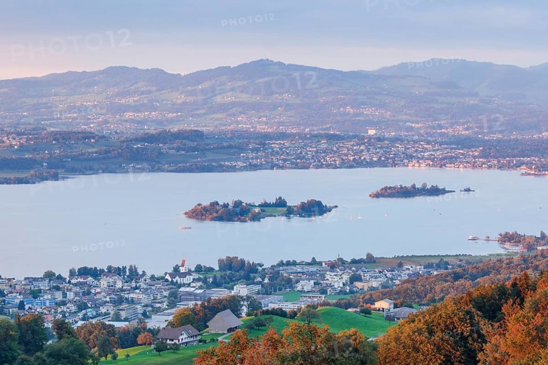 View at sunset from Feusisberg over Lake Zurich with the islands of Ufenau and Luetzelau