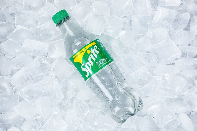 Sprite lemonade soft drink drink in a plastic bottle on ice cube ice cubes