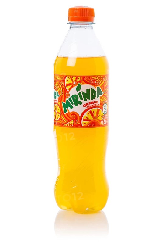 Mirinda lemonade soft drink beverage in a plastic bottle cut-out isolated against a white background