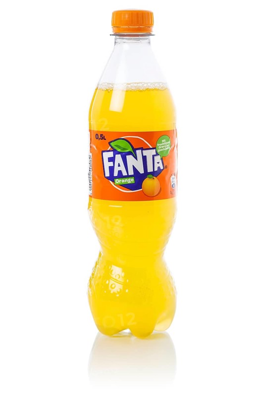 Fanta Orange lemonade soft drink beverage in a plastic bottle cut-out isolated against a white background