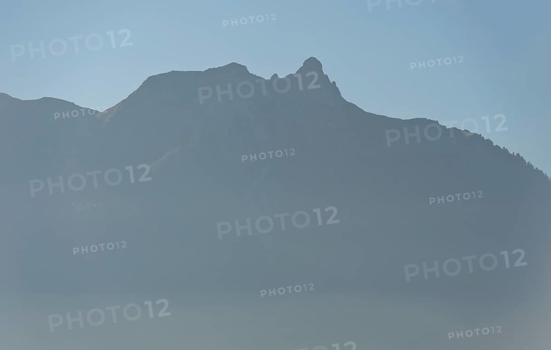 Pierre Avoi peak in the morning mist