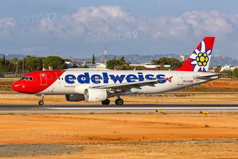 An Edelweiss Airbus A320 with registration HB-IHX at Faro Airport