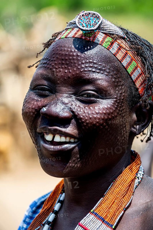 Woman with beauty scars from the Toposa tribe