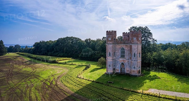 The Belvedere Tower over Powderham Park from a drone