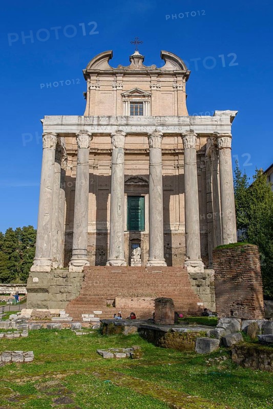 Historic facade of Temple of Pius and Faustina with staircase and ancient columns