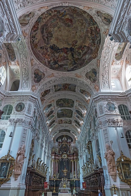 Baroque church room with altar and choir stalls